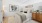 bedroom with bed and wall art