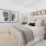 bedroom with bed and wall art