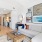 living room with couch coffee table and view of the kitchen