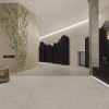 Lobby with front desk and black structural wall art