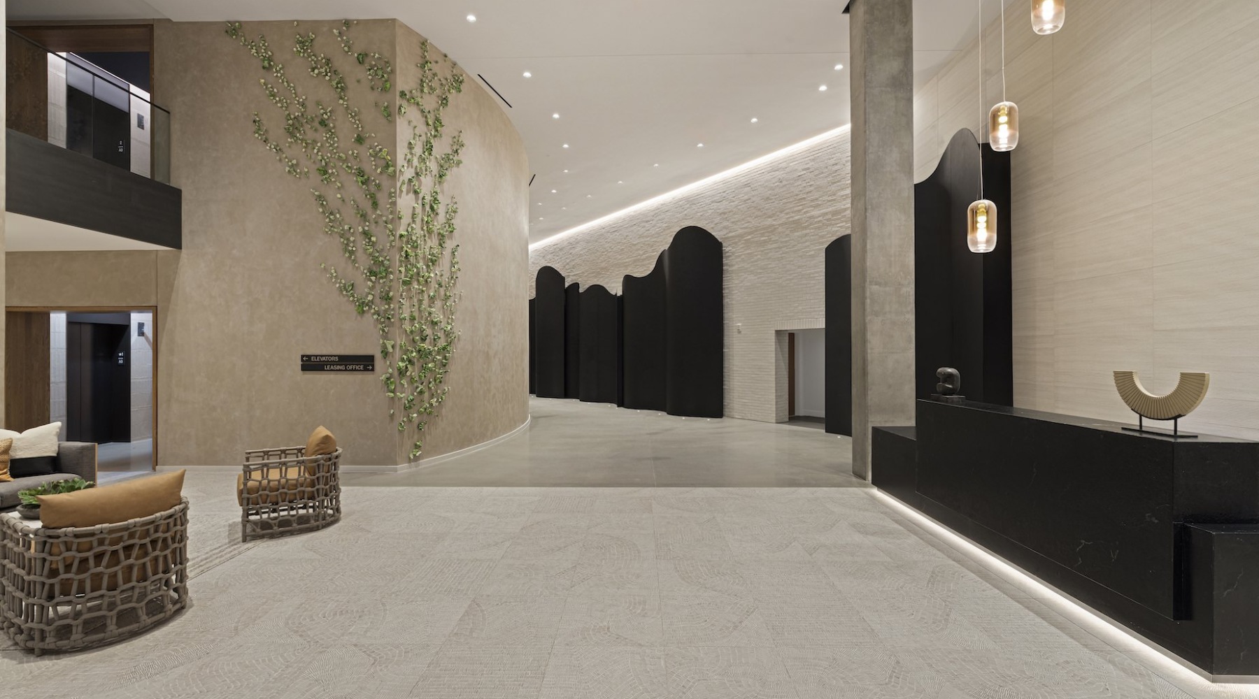 Lobby Lobby with front desk and black structural wall art