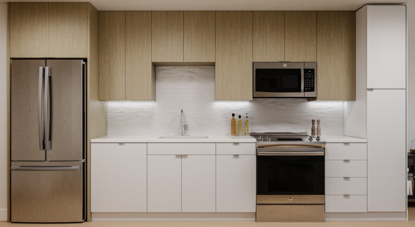 Kitchen with tile backsplash, stainless steel appliances, and under cabinet lighting