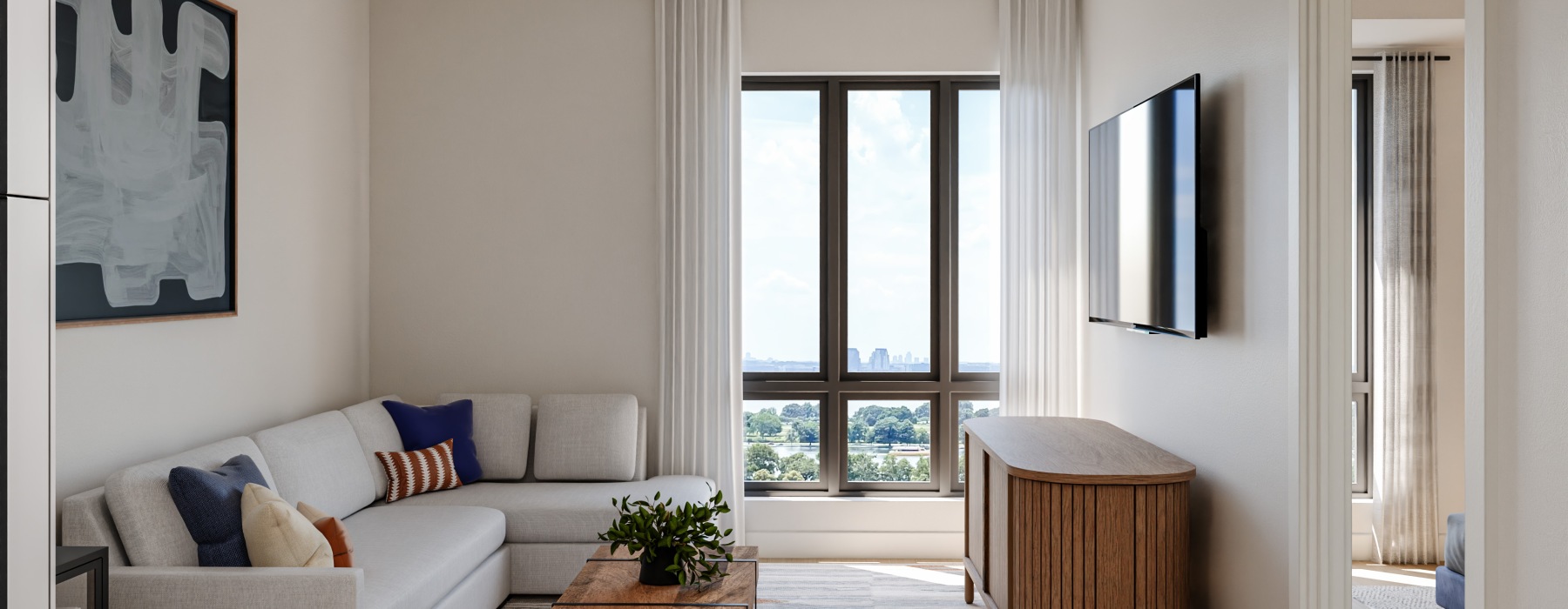 Open concept living room with city views 